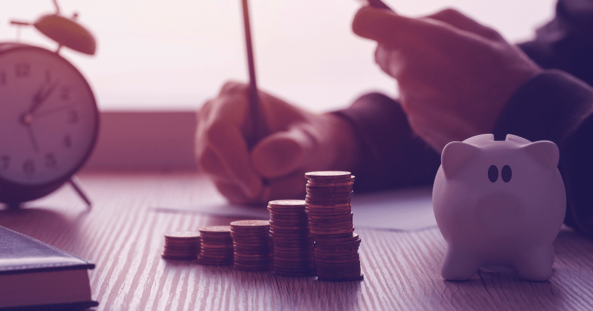 Piggy bank and stack of coins