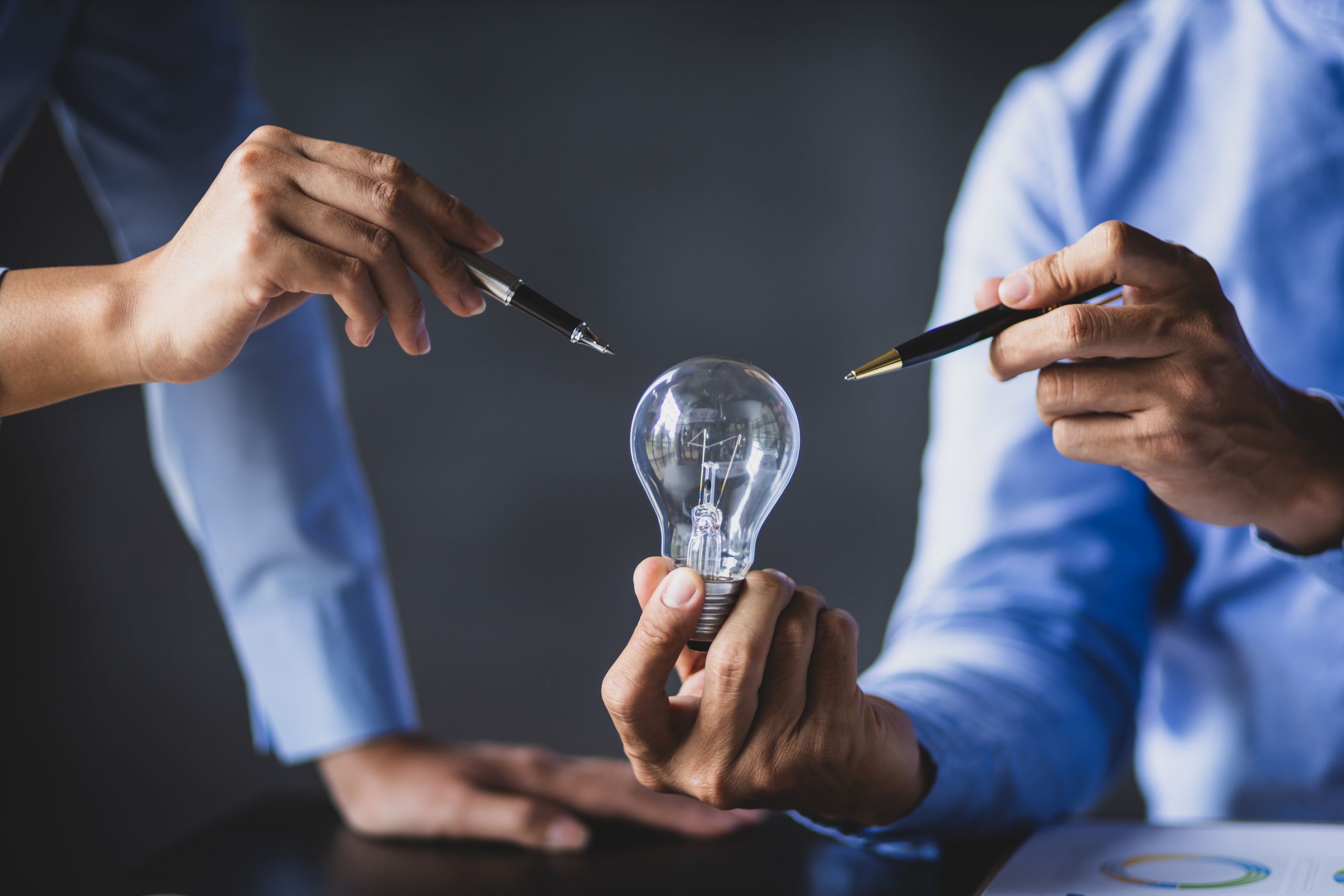 Brainstorming innovative concept, light bulb symbol.