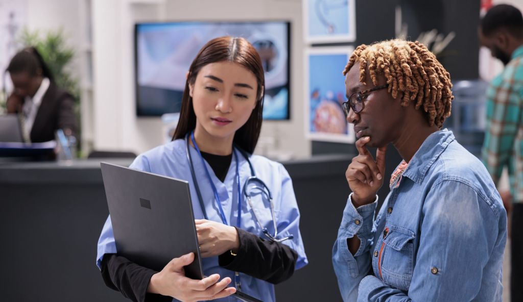 Female patient listening attentively to doctor recommendations