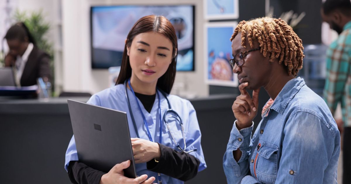 Female patient listening attentively to doctor recommendations