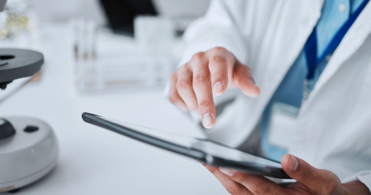 hospital-doctor-and-hands-with-tablet-for-researc-2025-04-06-10-25-41-utc