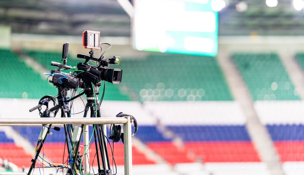 professional video camera broadcasting a football match