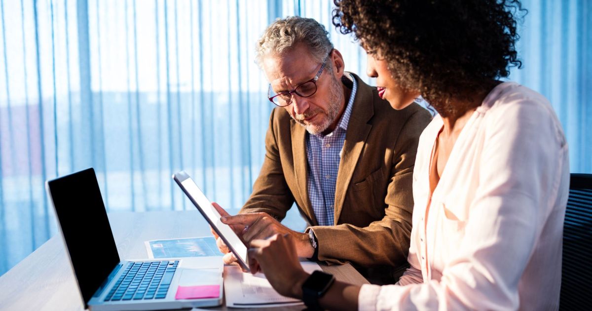 two-people-working-in-an-office-2025-10-28-21-49-18-utc