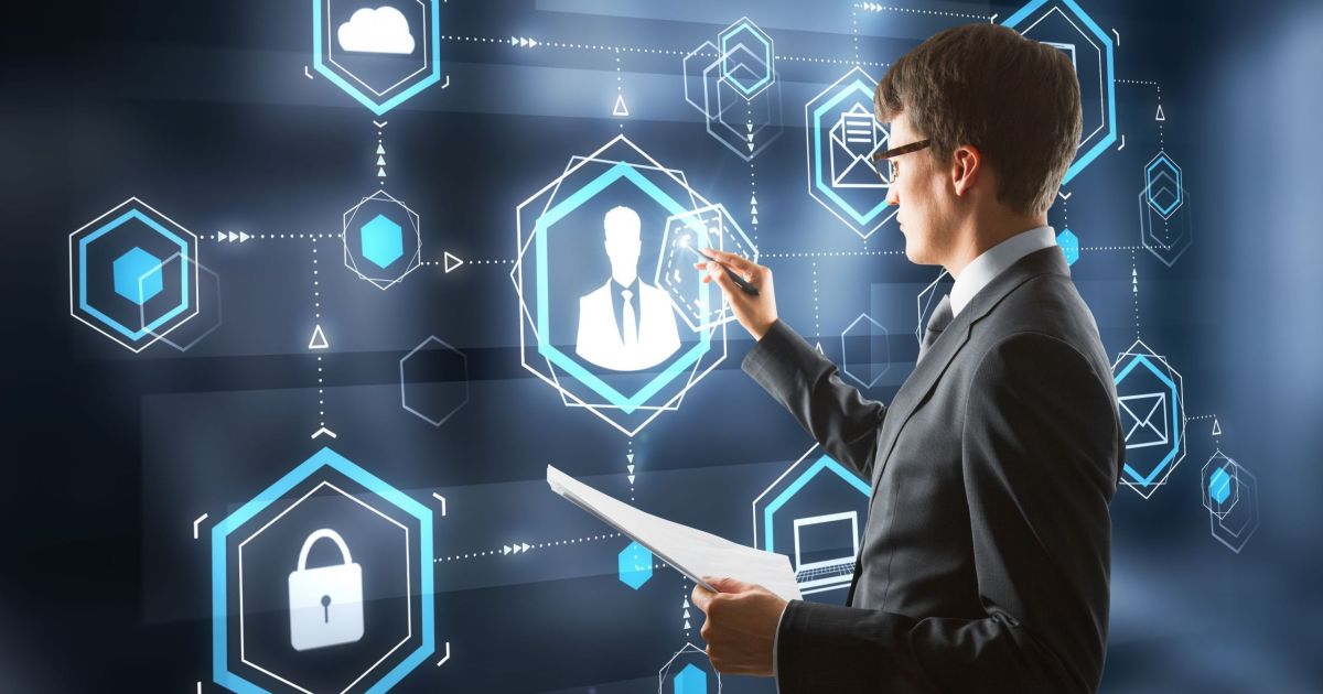 Cybersecurity professional using an abstract screen.