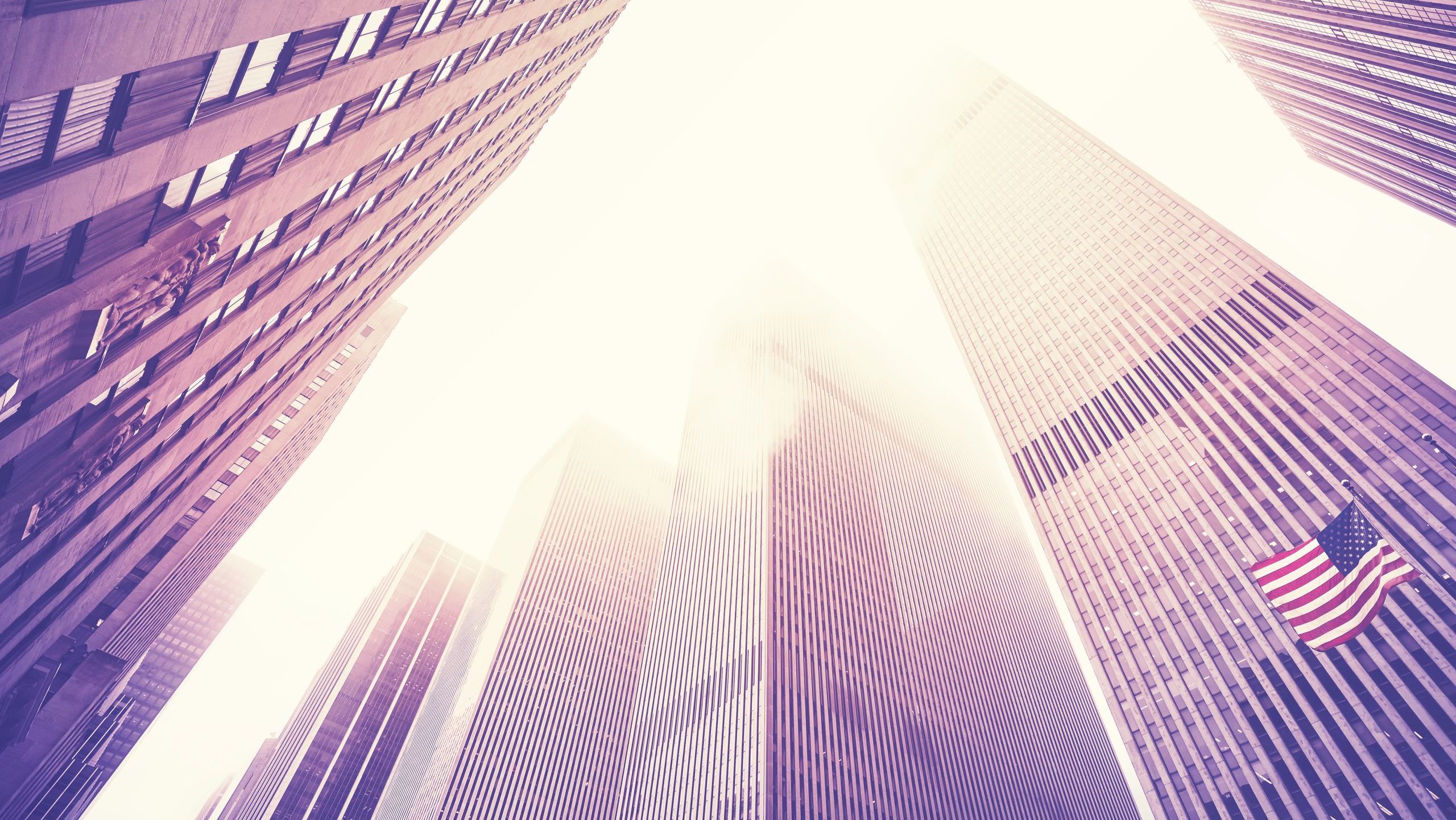 Manhattan skyscrapers in fog, New York City, USA.