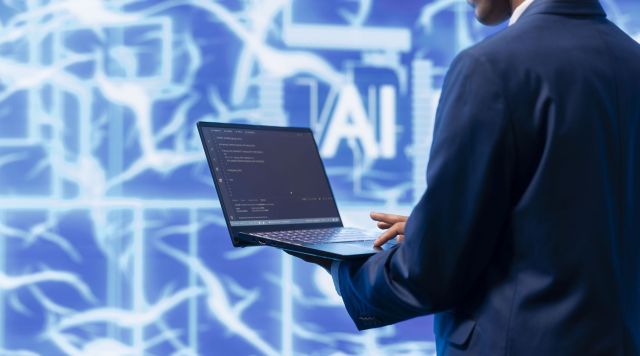 Technician writing code for AI applications development on notebook