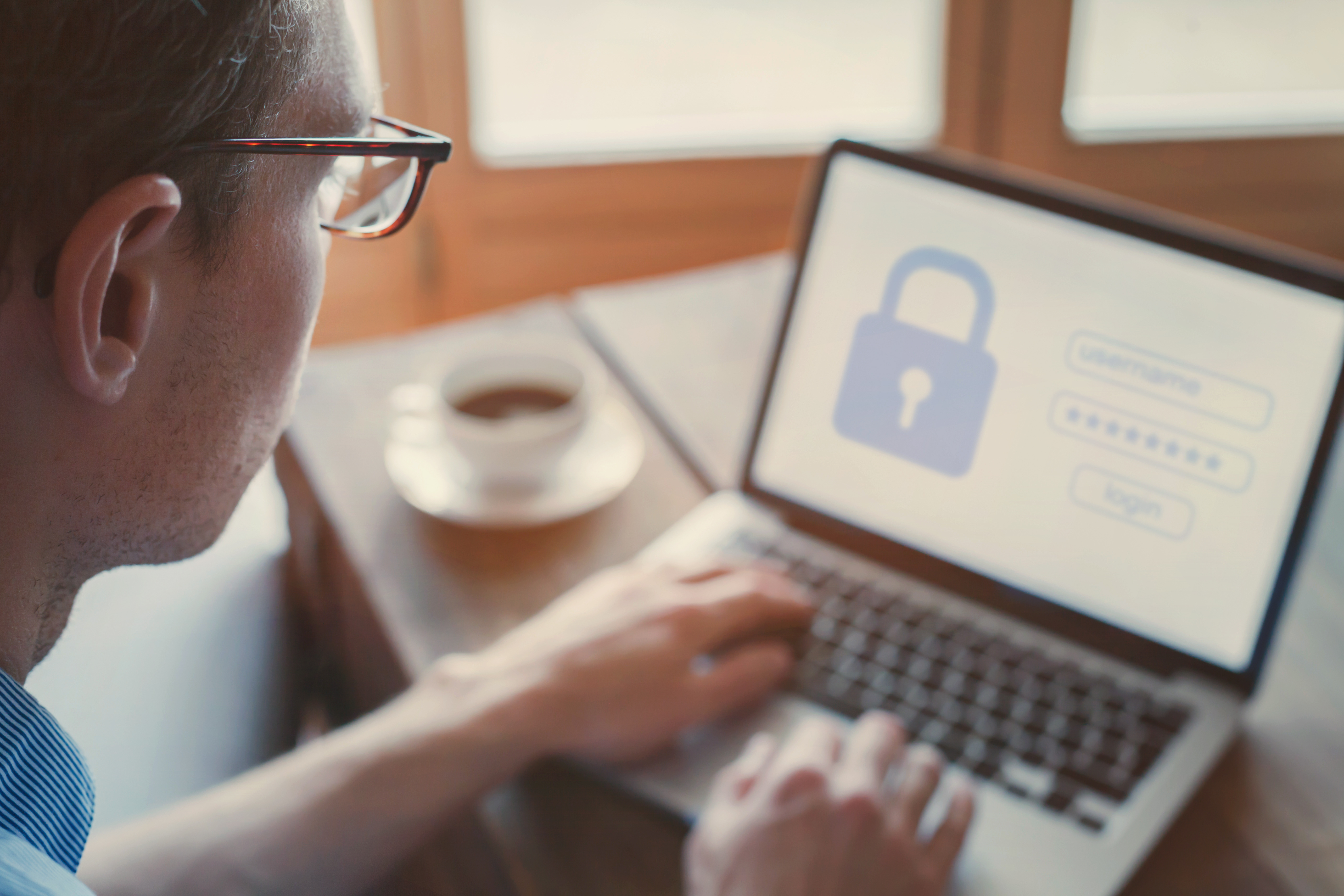 data protection and internet security concept user typing login