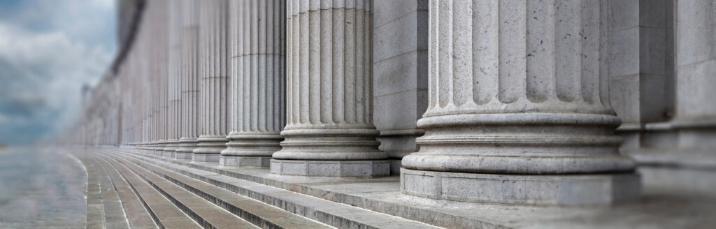 Stone colonnade and stairs detail Classical pillars row in a building facade